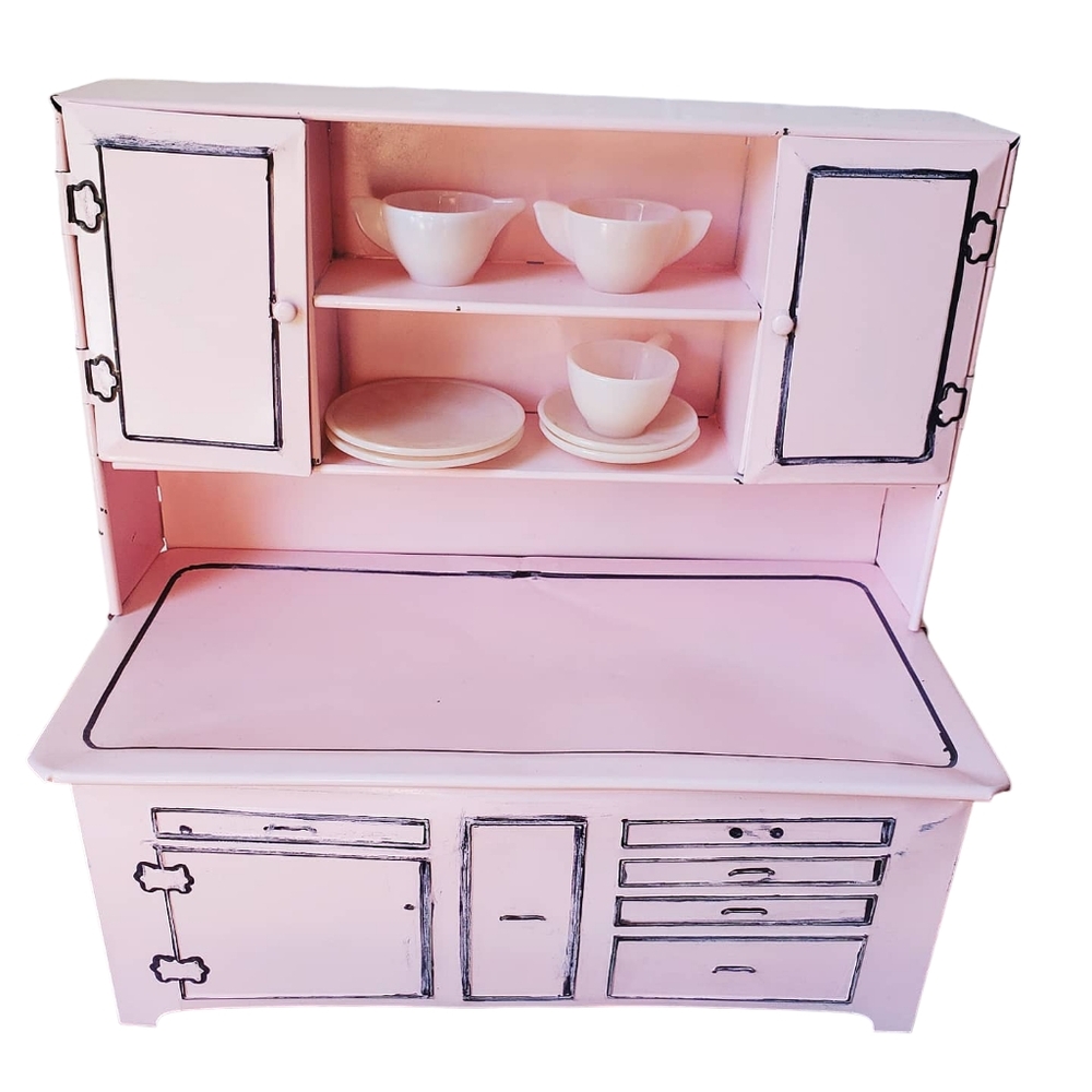 Vintage pink tin Hoosier cabinet toy